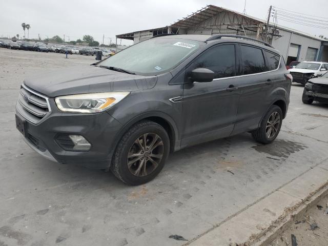 FORD ESCAPE SE 2017 with VIN 1FMCU0GD1HUE93973 - Photo from auction