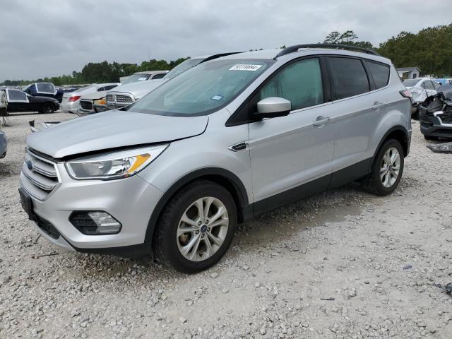 FORD ESCAPE SE 2018 with VIN 1FMCU0GD3JUA97064 - Photo from auction