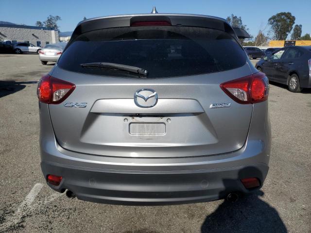 Photo 6 from auction – 2014 MAZDA CX-5 TOURI with VIN JM3KE2CY7E0366771