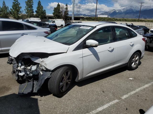 FORD FOCUS SE 2014 with VIN 1FADP3F25EL453355 - Photo from auction