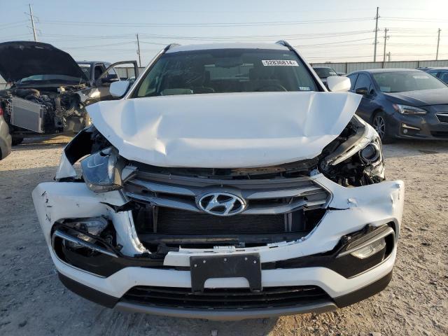 Photo 5 from auction – 2017 HYUNDAI SANTA FE S with VIN 5NMZU3LBXHH026935
