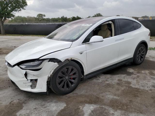 TESLA MODEL X 2016 with VIN 5YJXCBE45GFS00610 - Photo from auction