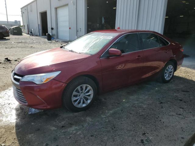 TOYOTA CAMRY LE 2017 with VIN 4T1BF1FK9HU812886 - Photo from auction