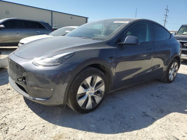 TESLA MODEL Y 2023 with VIN 7SAYGDED1PF947595 - Photo from auction