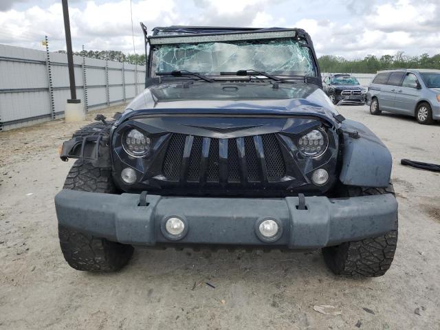 Photo 5 from auction – 2015 JEEP WRANGLER U with VIN 1C4BJWDG3FL570002