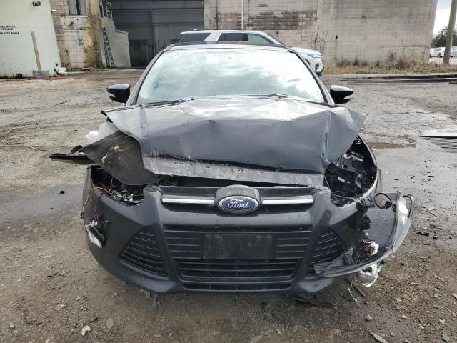 Photo 5 from auction – 2014 FORD FOCUS TITA with VIN 1FADP3J2XEL101802