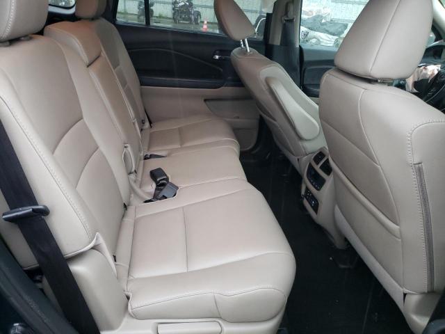 Photo 11 from auction – 2017 HONDA PILOT TOUR with VIN 5FNYF5H90HB010476