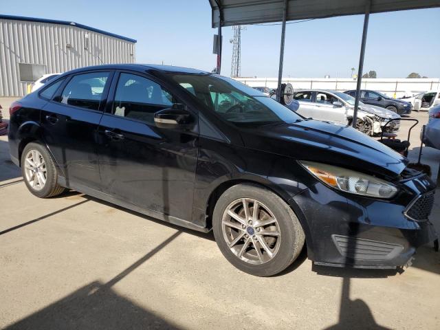 Photo 4 from auction – 2016 FORD FOCUS SE with VIN 1FADP3F29GL286579