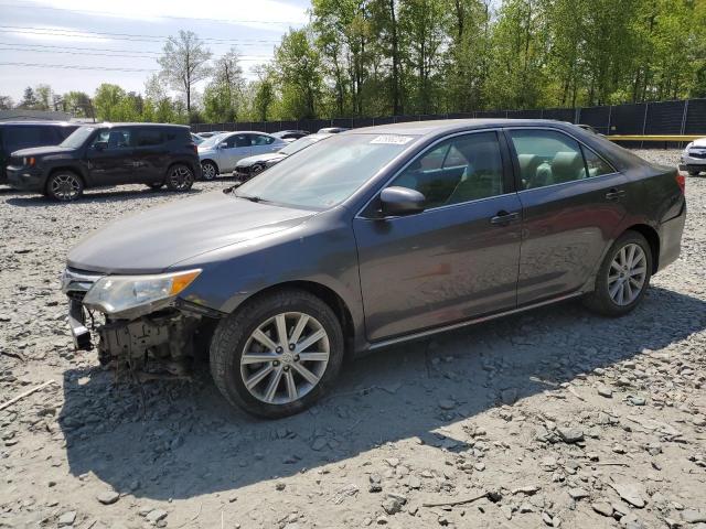 TOYOTA CAMRY L 2014 with VIN 4T4BF1FKXER370878 - Photo from auction
