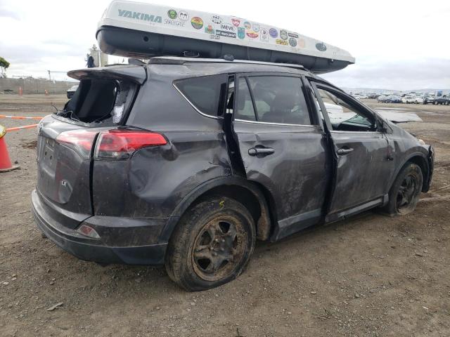 Photo 3 from auction – 2018 TOYOTA RAV4 LE with VIN JTMZFREV9JJ752578