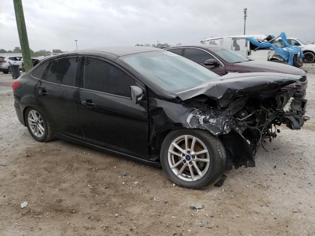 Photo 4 from auction – 2015 FORD FOCUS SE with VIN 1FADP3F27FL250341