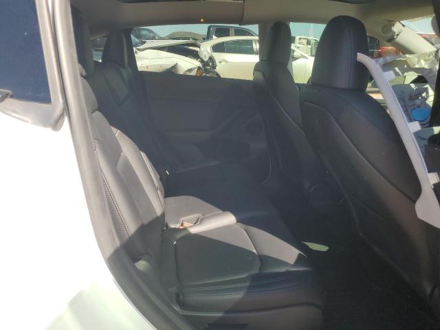 Photo 10 from auction – 2023 TESLA MODEL Y with VIN 7SAYGAEE1PF770201