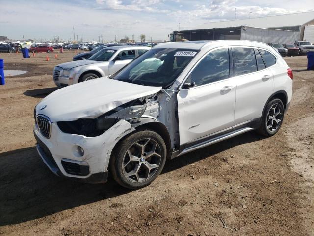 BMW X1 XDRIVE2 2017 with VIN WBXHT3Z37H4A56584 - Photo from auction
