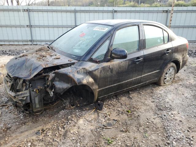 SUZUKI SX4 LE 2012 with VIN JS2YC5A37C6302294 - Photo from auction