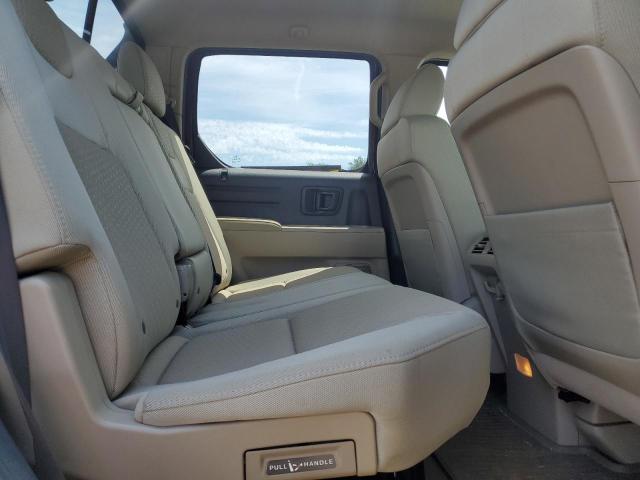 Photo 10 from auction – 2011 HONDA RIDGELINE with VIN 5FPYK1F42BB006357
