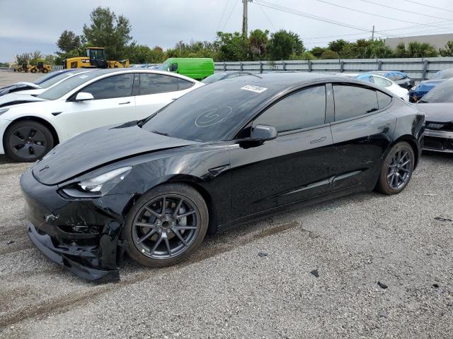 TESLA MODEL 3 2023 with VIN 5YJ3E1EA2PF495769 - Photo from auction