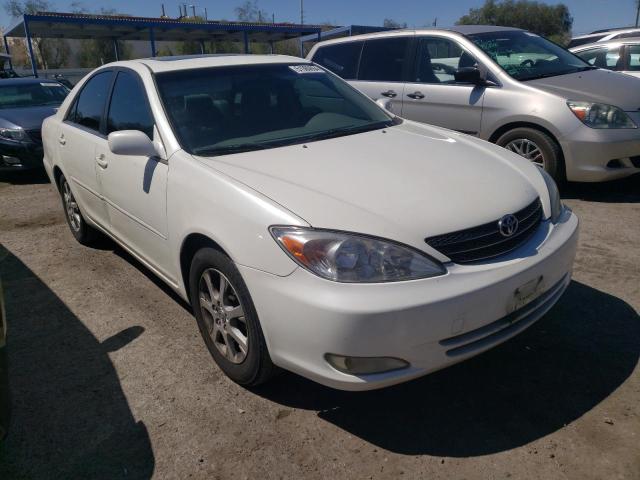 Photo 4 from auction – 2004 TOYOTA CAMRY LE with VIN JTDBE32K840252580