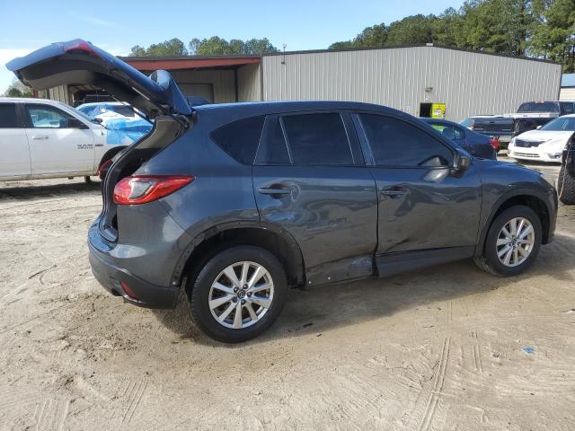 Photo 3 from auction – 2015 MAZDA CX-5 TOURI with VIN JM3KE2CY2F0447582