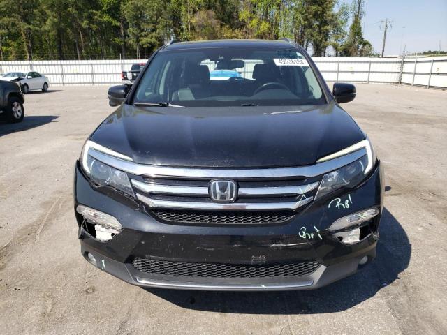 Photo 5 from auction – 2018 HONDA PILOT TOUR with VIN 5FNYF5H93JB027049