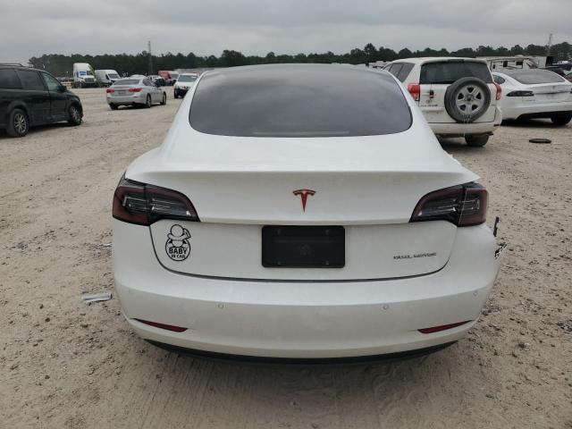 Photo 6 from auction – 2021 TESLA MODEL 3 with VIN 5YJ3E1EB4MF051099
