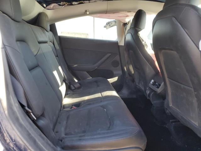 Photo 10 from auction – 2023 TESLA MODEL Y with VIN 7SAYGAEE6PF966635