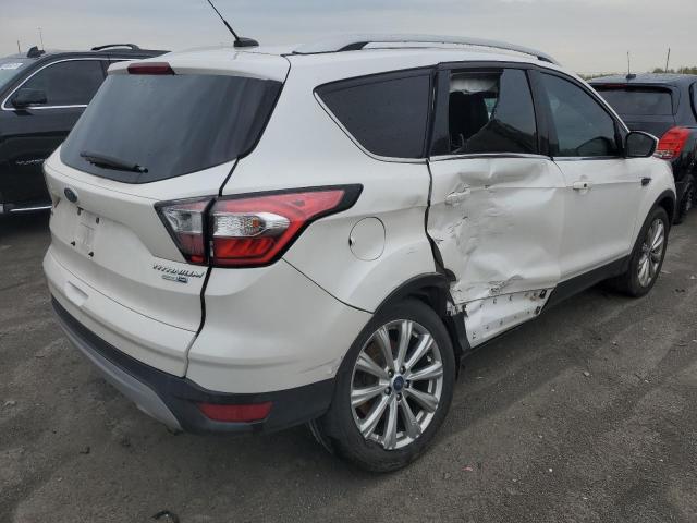 Photo 3 from auction – 2017 FORD ESCAPE TIT with VIN 1FMCU9J98HUA65035