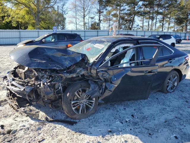 TOYOTA CAMRY LE 2017 with VIN 4T1BF1FKXHU454794 - Photo from auction