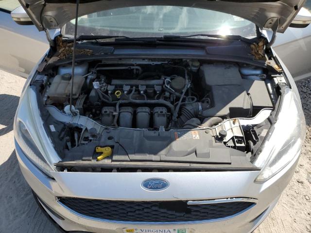Photo 11 from auction – 2015 FORD FOCUS SE with VIN 1FADP3F23FL382481