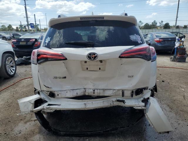 Photo 6 from auction – 2018 TOYOTA RAV4 LE with VIN JTMZFREV0JJ171163