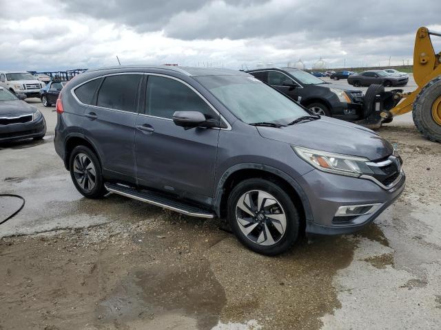 Photo 4 from auction – 2016 HONDA CR-V TOURI with VIN 5J6RM3H94GL011697