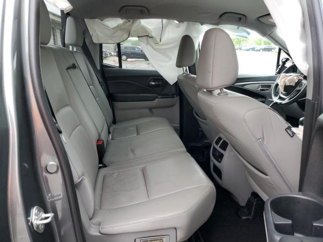 Photo 10 from auction – 2018 HONDA RIDGELINE with VIN 5FPYK2F62JB001875