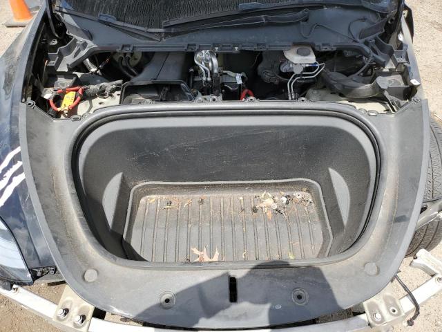 Photo 11 from auction – 2021 TESLA MODEL Y with VIN 5YJYGDEE2MF305811