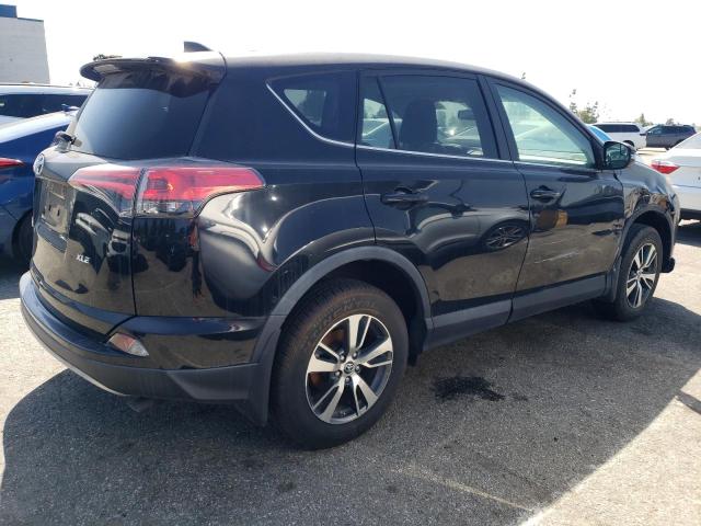 Photo 3 from auction – 2018 TOYOTA RAV-4 with VIN 2T3WFREV0JW466848