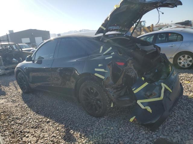 Photo 2 from auction – 2023 TESLA MODEL Y with VIN 7SAYGAEE0PF905779