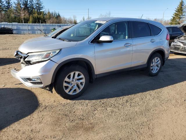 HONDA CR-V EX 2015 with VIN 2HKRM4H59FH129563 - Photo from auction