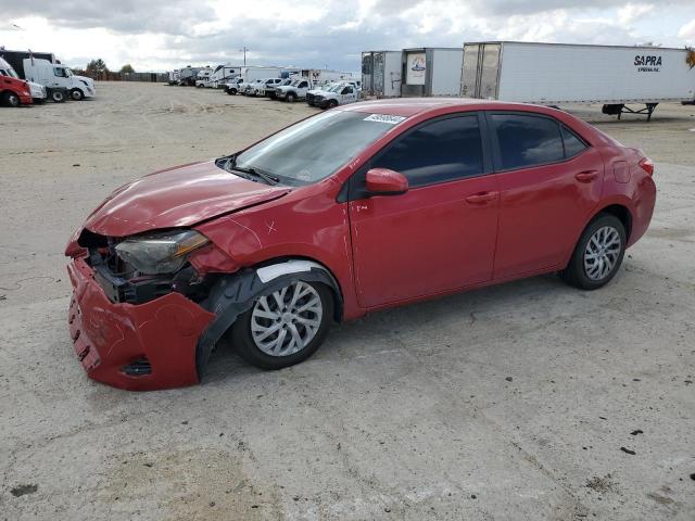 TOYOTA COROLLA L 2019 with VIN 2T1BURHE1KC230852 - Photo from auction