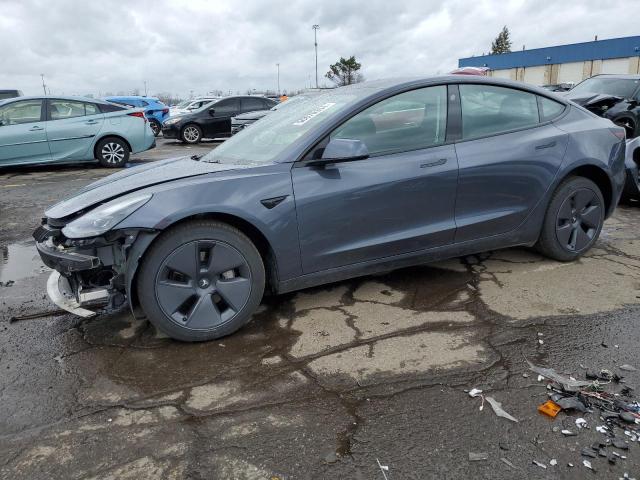 TESLA MODEL 3 2022 with VIN 5YJ3E1EB7NF343945 - Photo from auction