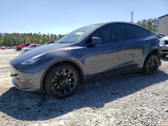 TESLA MODEL Y 2023 with VIN 7SAYGDEE6PA045630 - Photo from auction