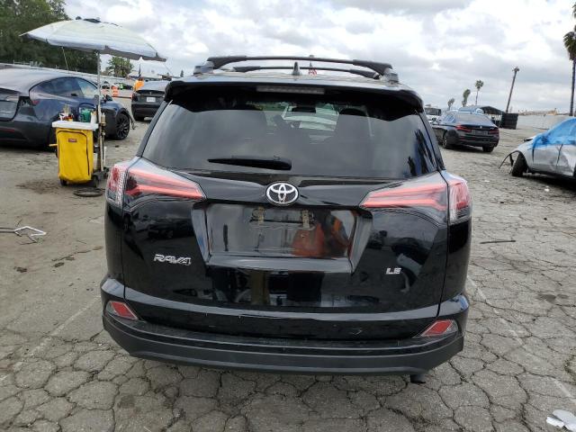 Photo 6 from auction – 2018 TOYOTA RAV4 LE with VIN 2T3ZFREV6JW435410