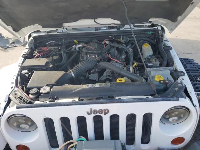 Photo 11 from auction – 2011 JEEP WRANGLER U with VIN 1J4HA5H12BL615736
