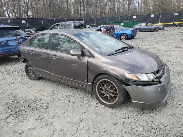Photo 4 from auction – 2010 HONDA CIVIC EX with VIN 19XFA1F80AE035074
