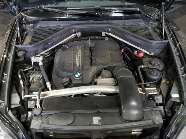 Photo 11 from auction – 2013 BMW X5 XDRIVE3 with VIN 5UXZV4C55D0E14857