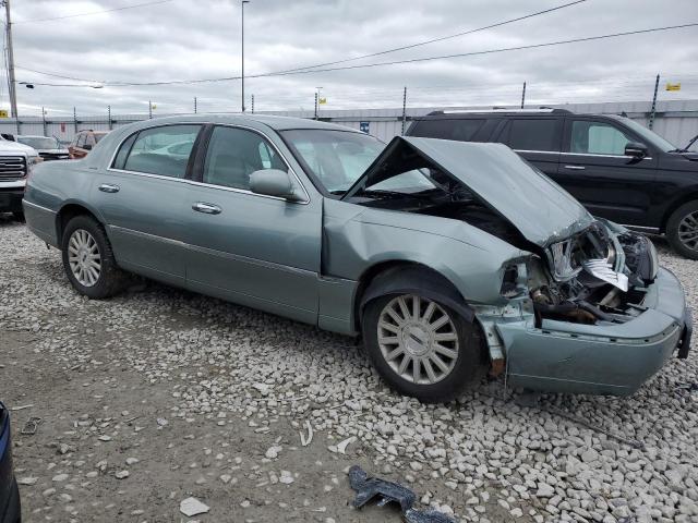 Photo 4 from auction – 2004 LINCOLN TOWN CAR E with VIN 1LNHM81W64Y637017
