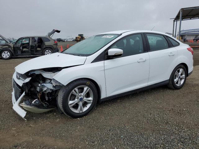FORD FOCUS SE 2014 with VIN 1FADP3F21EL210240 - Photo from auction