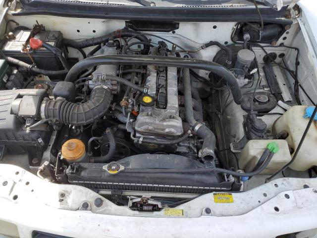 Photo 11 from auction – 2000 CHEVROLET TRACKER with VIN 2CNBJ13CXY6951144
