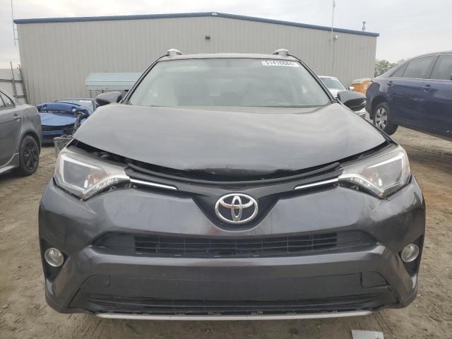 Photo 5 from auction – 2016 TOYOTA RAV4 XLE with VIN JTMWFREV9GD090589