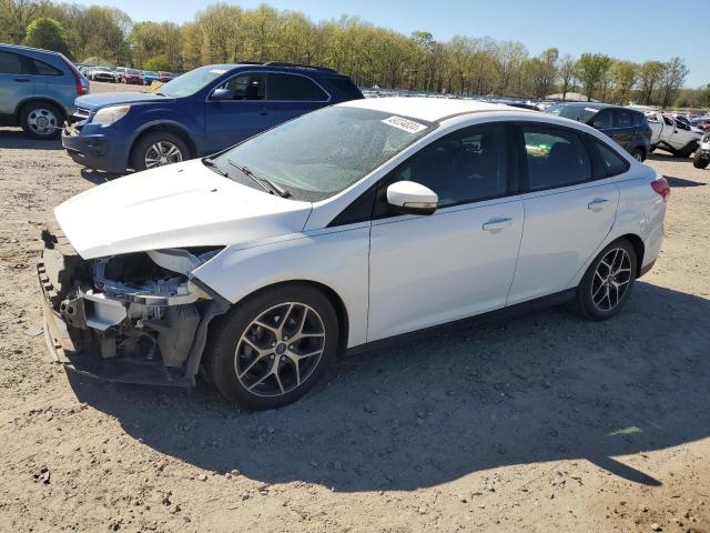 FORD FOCUS SE 2017 with VIN 1FADP3FE9HL331483 - Photo from auction