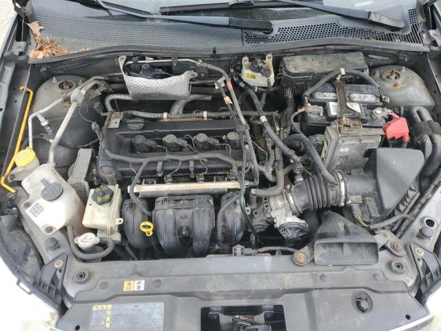 Photo 11 from auction – 2009 FORD FOCUS S with VIN 1FAHP34N09W201323
