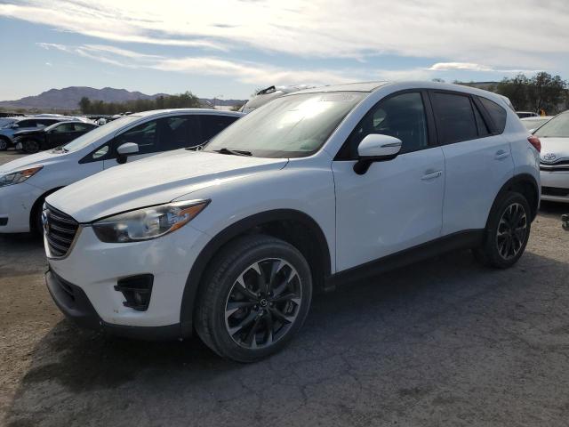 MAZDA CX-5 GT 2016 with VIN JM3KE2DYXG0754384 - Photo from auction