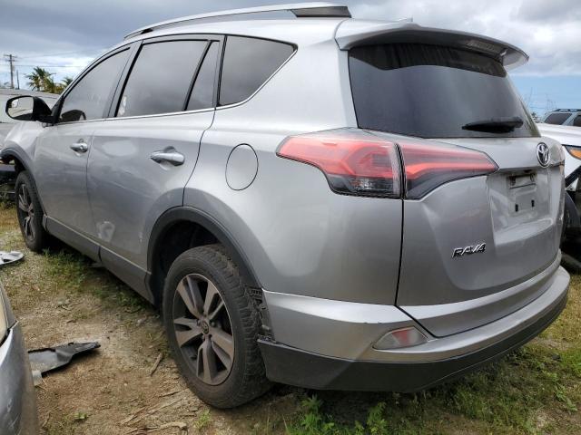 Photo 2 from auction – 2018 TOYOTA RAV4 LE with VIN JTMZFREV2JJ198056